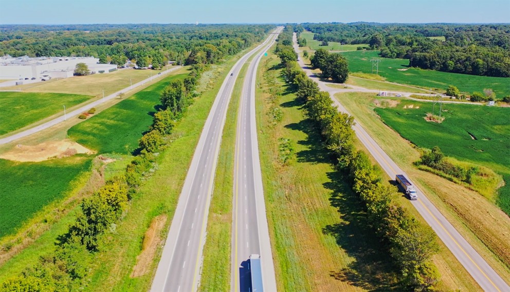 aerial view of trucks on the interstate