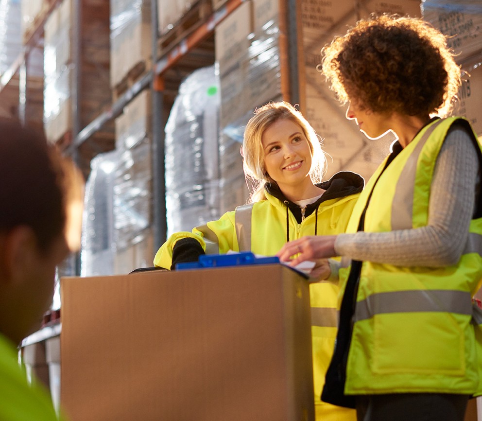 two people in a warehouse